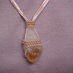 Natural citrine crystal point hugged with sterling silver beads.