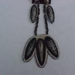 Orthoceros fossils on suede with spiral rope necklace and pearl clasp.Earrings on french wires.